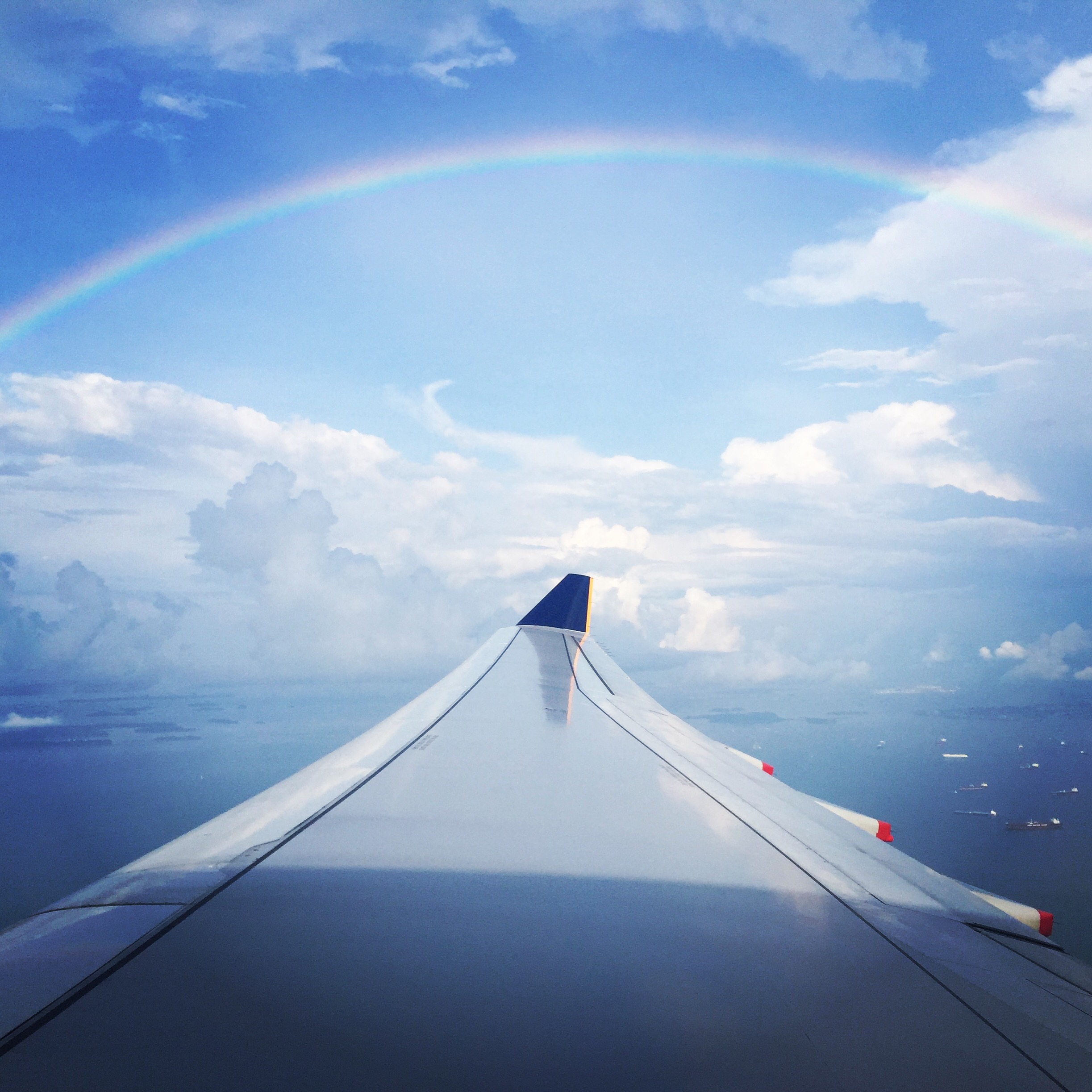 Beautiful full rainbow from plane